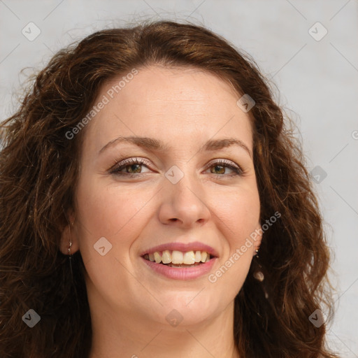 Joyful white young-adult female with long  brown hair and green eyes