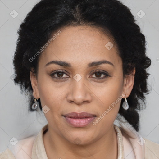 Joyful latino adult female with medium  brown hair and brown eyes