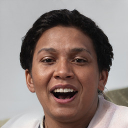 Joyful white adult female with short  brown hair and brown eyes