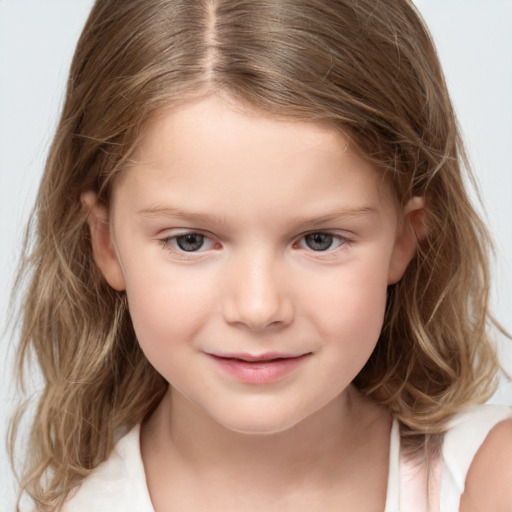 Joyful white child female with medium  brown hair and grey eyes