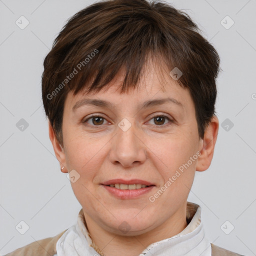 Joyful white adult female with short  brown hair and brown eyes