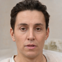 Neutral white adult male with short  brown hair and brown eyes