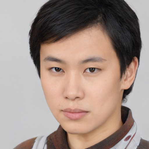 Neutral asian young-adult male with short  brown hair and brown eyes