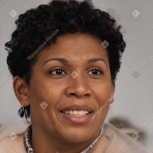 Joyful black adult female with short  brown hair and brown eyes