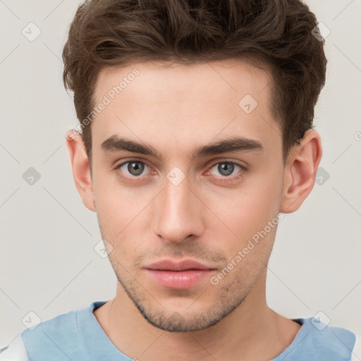 Neutral white young-adult male with short  brown hair and brown eyes