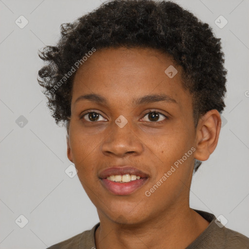 Joyful black young-adult female with short  brown hair and brown eyes