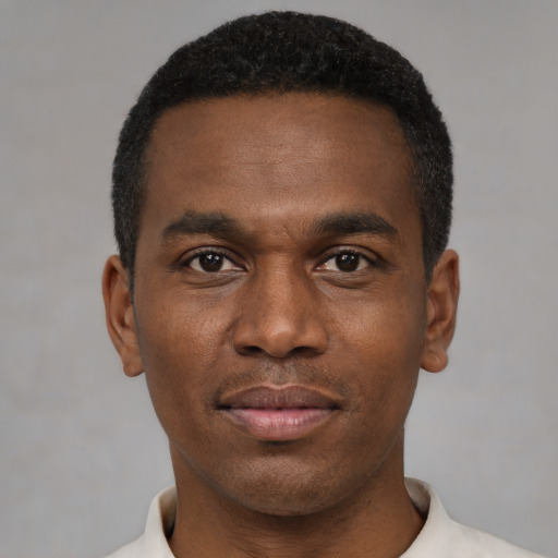 Neutral black young-adult male with short  black hair and brown eyes