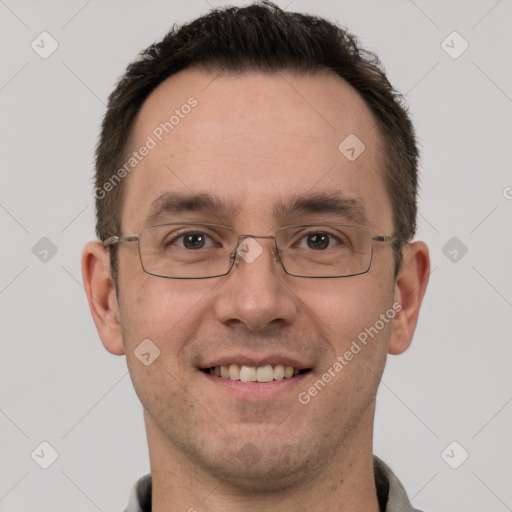 Joyful white adult male with short  brown hair and brown eyes