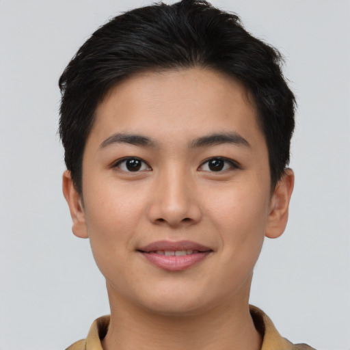 Joyful asian young-adult female with short  brown hair and brown eyes