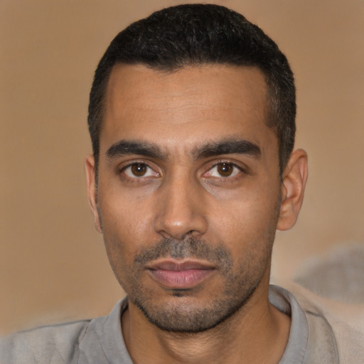 Neutral latino young-adult male with short  black hair and brown eyes