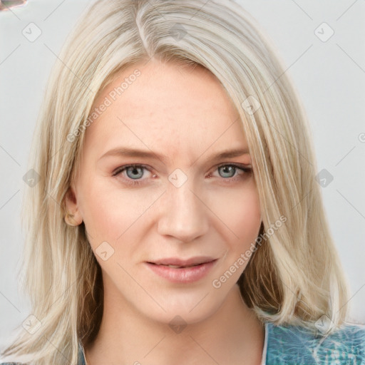 Joyful white young-adult female with long  brown hair and blue eyes