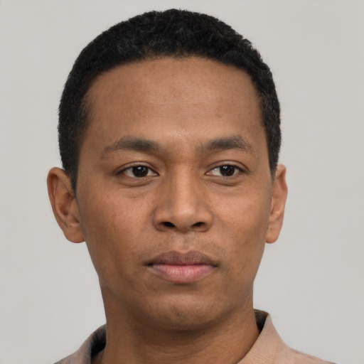 Neutral black young-adult male with short  black hair and brown eyes