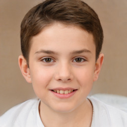 Joyful white child male with short  brown hair and brown eyes