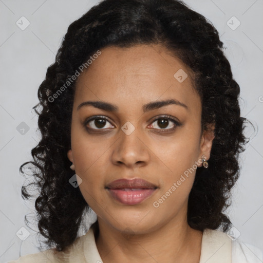 Joyful black young-adult female with medium  brown hair and brown eyes