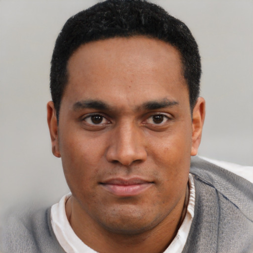 Neutral black young-adult male with short  black hair and brown eyes