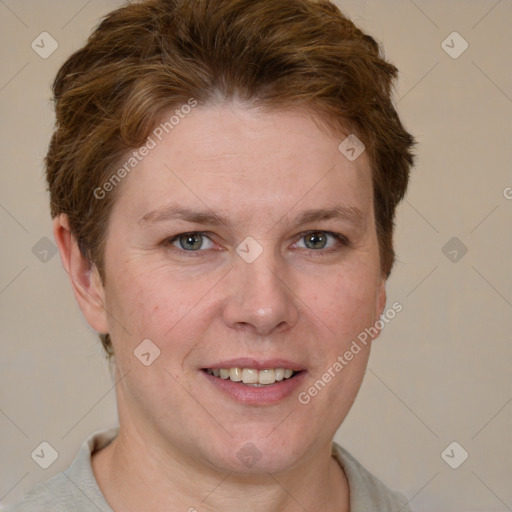 Joyful white adult female with short  brown hair and grey eyes