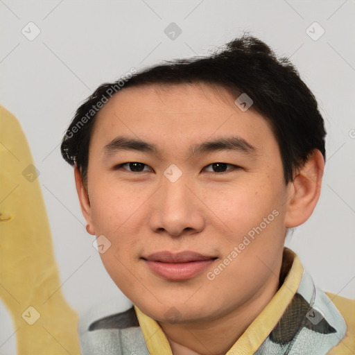 Joyful asian young-adult male with short  brown hair and brown eyes