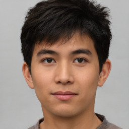 Neutral asian young-adult male with short  brown hair and brown eyes