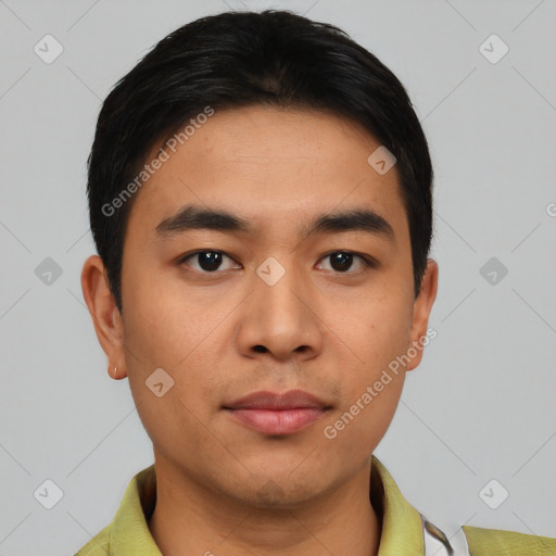 Joyful asian young-adult male with short  brown hair and brown eyes