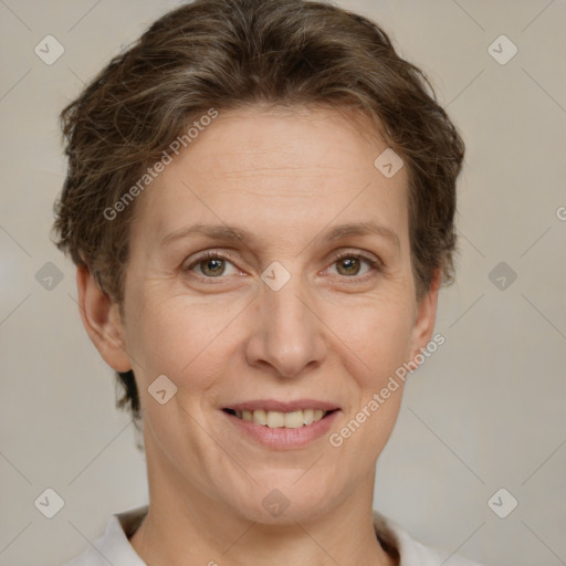 Joyful white adult female with short  brown hair and brown eyes