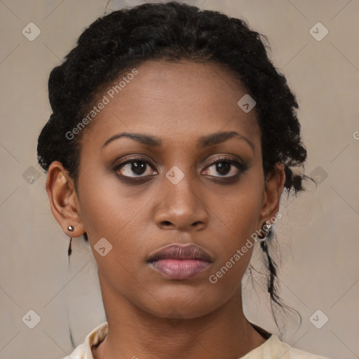 Neutral black young-adult female with medium  brown hair and brown eyes