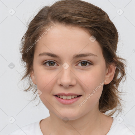 Joyful white child female with medium  brown hair and brown eyes