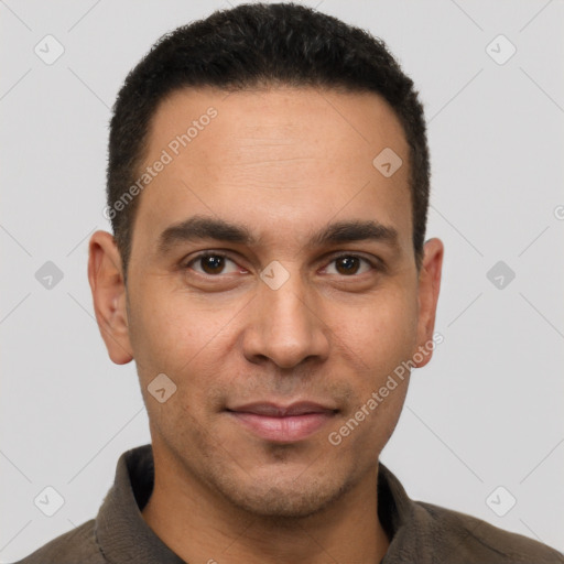 Joyful white adult male with short  brown hair and brown eyes