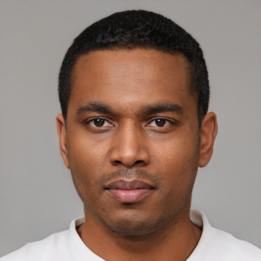 Neutral black young-adult male with short  black hair and brown eyes