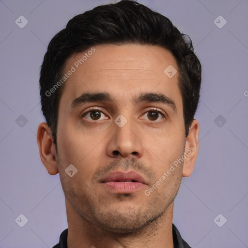 Neutral white young-adult male with short  black hair and brown eyes