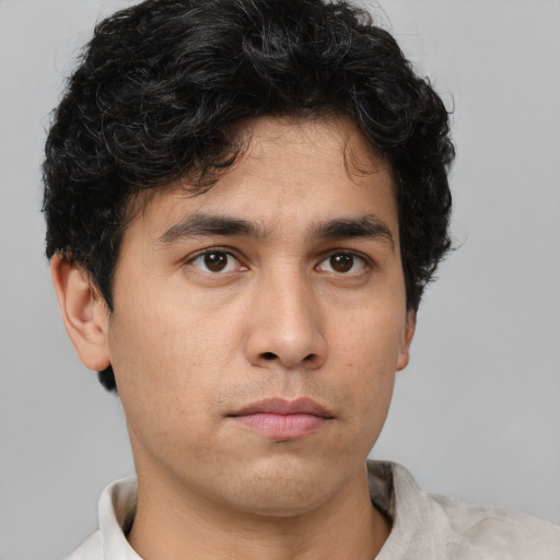 Neutral asian young-adult male with short  brown hair and brown eyes