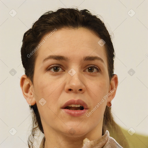 Joyful white adult female with short  brown hair and brown eyes