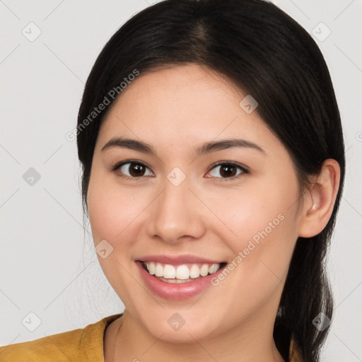 Joyful white young-adult female with medium  brown hair and brown eyes