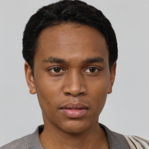 Neutral black young-adult male with short  black hair and brown eyes