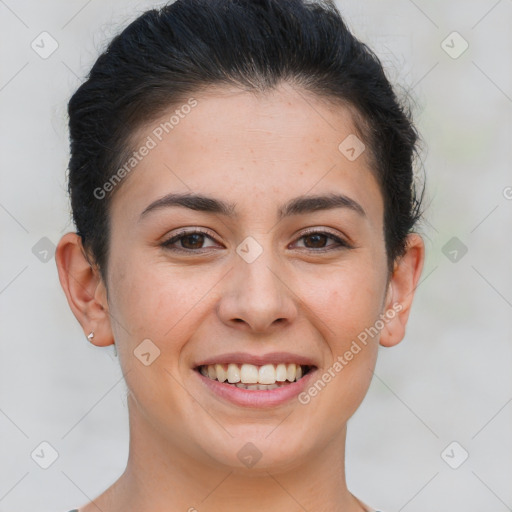 Joyful white young-adult female with short  brown hair and brown eyes