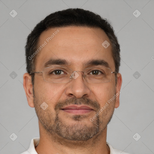 Joyful white adult male with short  brown hair and brown eyes