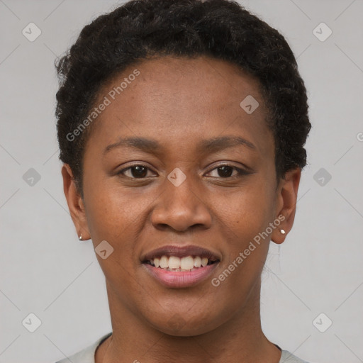 Joyful black young-adult female with short  brown hair and brown eyes