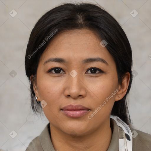 Joyful asian young-adult female with medium  brown hair and brown eyes