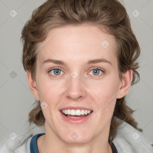 Joyful white young-adult female with medium  brown hair and blue eyes