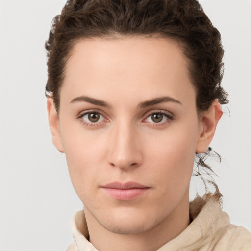 Neutral white young-adult female with short  brown hair and brown eyes