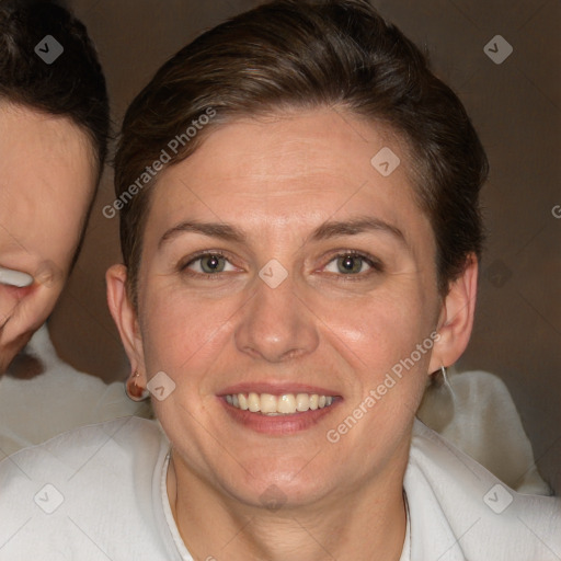 Joyful white adult female with short  brown hair and brown eyes