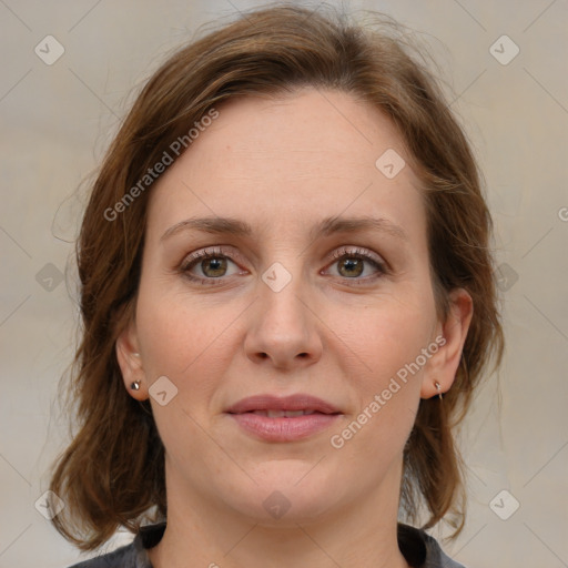 Joyful white young-adult female with medium  brown hair and blue eyes