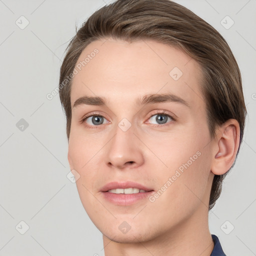 Joyful white young-adult female with short  brown hair and grey eyes