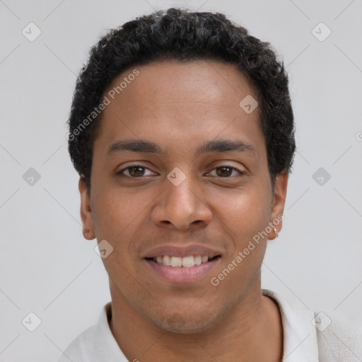 Joyful latino young-adult male with short  brown hair and brown eyes