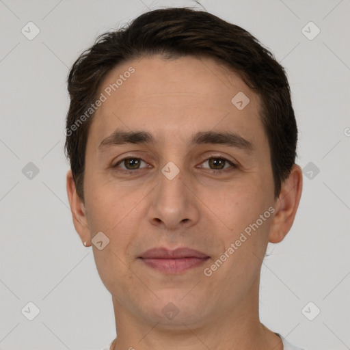 Joyful white young-adult male with short  brown hair and brown eyes