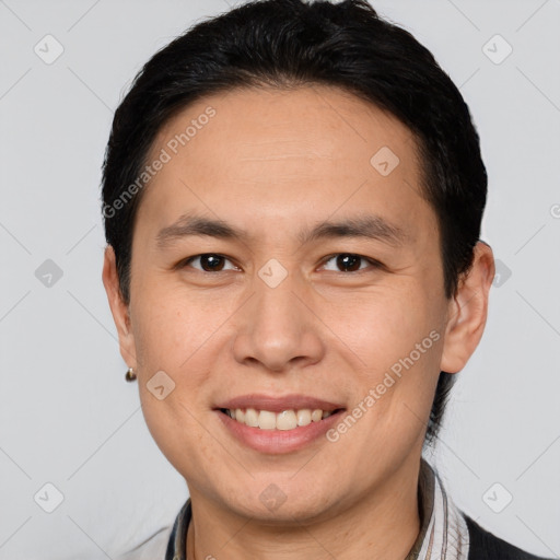 Joyful white young-adult male with short  brown hair and brown eyes