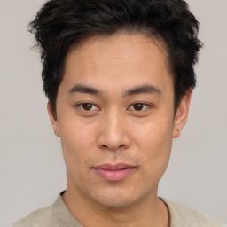 Neutral asian young-adult male with short  brown hair and brown eyes