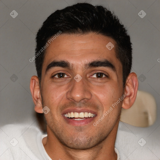 Joyful white young-adult male with short  black hair and brown eyes