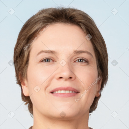 Joyful white adult female with short  brown hair and grey eyes