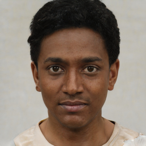 Neutral black young-adult male with short  black hair and brown eyes
