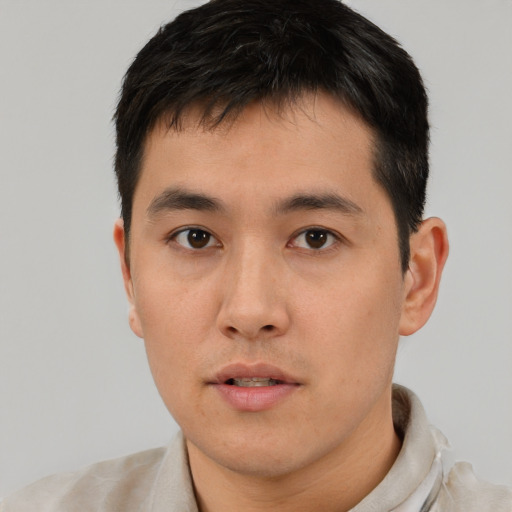 Neutral asian young-adult male with short  black hair and brown eyes